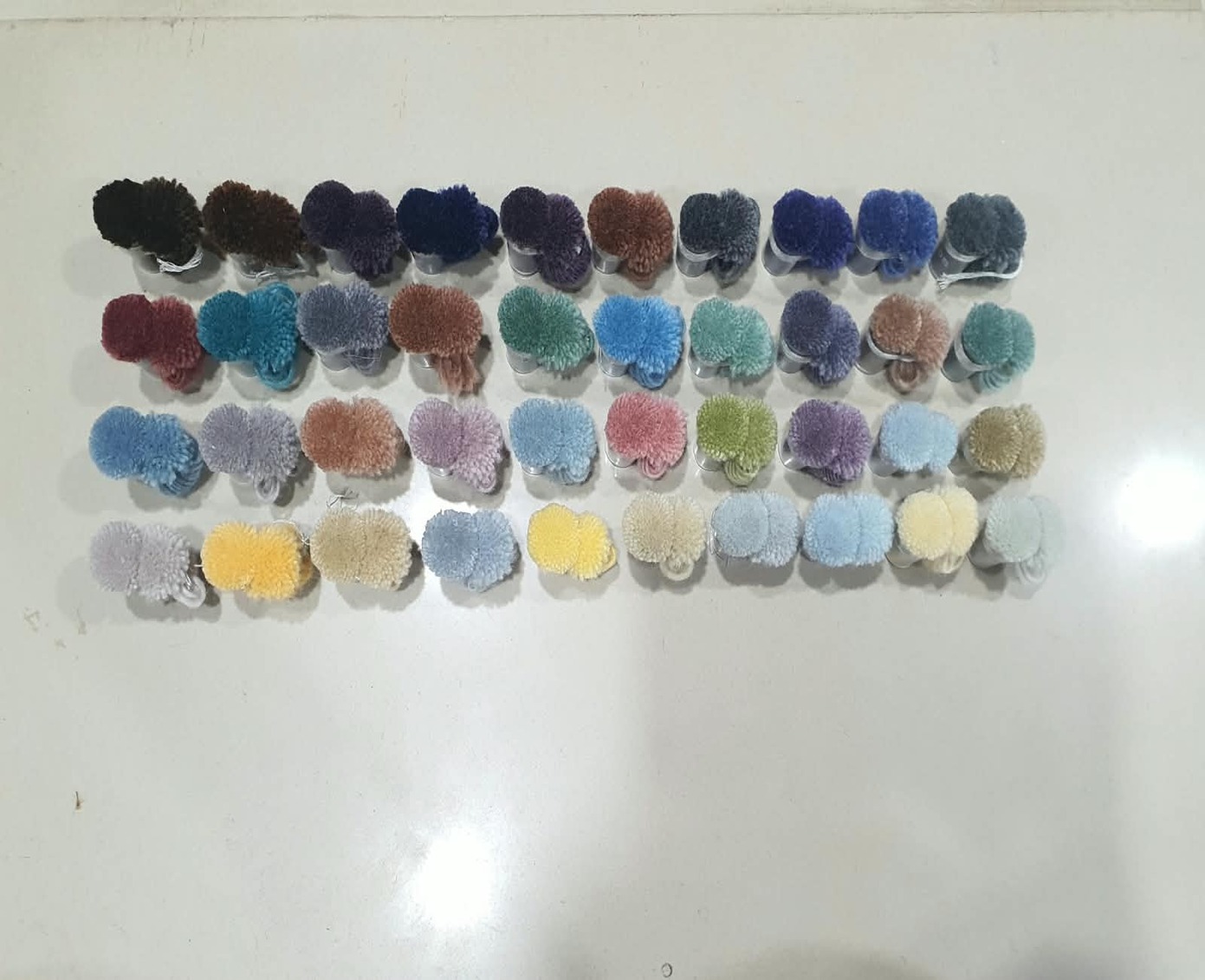 Colour and material swatches from Alfombra India